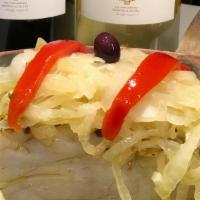Bacalhau Assado · Grilled Cod served with Onions, Garlic, Olive Oil and steamed Potatoes