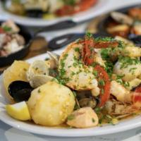 Parrilhada De Mariscos · Grilled Seafood Mix in White Wine and Garlic Sauce with Lobster, Scallops, Shrimp, Clams, Mu...