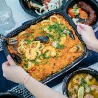 Seafood Rice Combo For 3 · Arroz de Mariscos for parties of 3 including Appetizers and Dessert Codfish Croquettes, Shri...