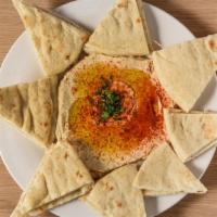 Hummus App · Our famous dip that will rock your world! Chick peas thickly puréed with garlic, tahini, & l...