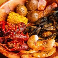 Combo #1 · 1/2 lb shrimp (no head), 1/2 lb black mussel, 1/2 lb crawfish, sausage, corn, potato.