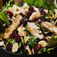 Tutto Salad · mixed greens, grilled chicken, cranberries, almond slices, feta cheese, passion fruit dressing