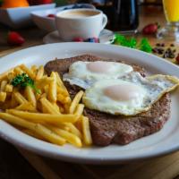 El Fuerte - Beef Steak · Beefsteak, 2 fried eggs, French fries, toast and coffee with milk and beef steak.