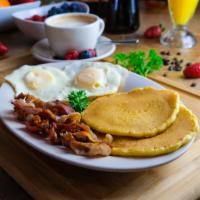 American Style Full Breakfast · The American style full breakfast with delicious 2 eggs, crisp bacon , pancakes.