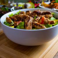 Caesar Salad Mix · Skirt steak, chicken, and shrimp. Ensalada cesar con churrasco, pollo, camarones.