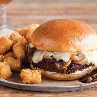 Chimay Burger · Fresh Angus beef piled high with Chimay cheese, sautéed mushrooms, caramelized onions & garl...