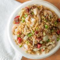 Combination Fried Rice · With shrimp, pork and chicken.
