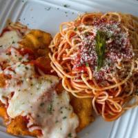Chicken Parmesan Entrée · Hand Pounded Chicken Breast Fried to Perfection and Served Over Spaghetti. Topped with Marin...