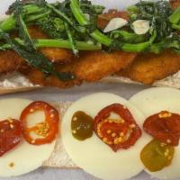 The Big Rob Hero · Hand Breaded Chicken Cutlets Fried then Topped with Parmesan Broccoli Rabe, Hot Cherry Peppe...