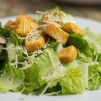 Caesar Salad · Caesar dressing mixed with fresh romaine lettuce.