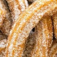 Churros · Tossed in Cinnamon and Sugar