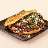 Classic Arepa · Your choice of protein with crumbled cotija cheese and cilantro between two warm, fresh arep...