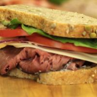 Roast Beef & Cheese Sandwich · Sliced roast beef and aged Provolone cheese. Served cold with fresh romaine lettuce, tomato,...