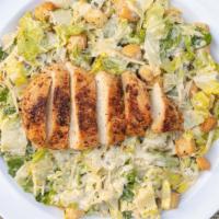 Chicken Caesar · romaine lettuce, parmesan cheese, and seasoned croutons tossed in Caesars dressing topped wi...