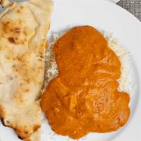 Butter Chicken · Chicken cooked in creamy rich sauce, made with tomato, onion and butter.