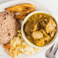 Curry Goat · Served with rice and peas or white rice with stew vegetables and plantain.