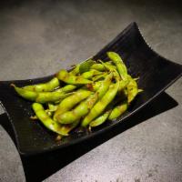 Spicy Soho Edamame · Bowl of steamed green soybeans sauteed in spicy chili sauce. vegan, spicy.