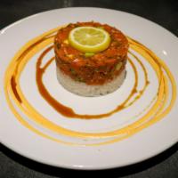Tuna Rok · Daily fresh tuna, avocado and crunchy onions mixed with spicy mayo on a bed of sushi rice.