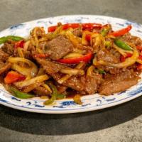 Pepper Steak · Stir-fried tender beef, onions, and mixed peppers