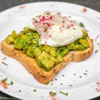Smashed Avocado Toast · Whole wheat toast topped with a poached egg and shaved radish.