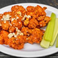 Spicy Buffalo Cauliflower Appetizer · Shaved celery, blue cheese crumbles.
