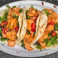 Bang Bang Shrimp Tacos · Three shrimp tacos. Served with mixed greens and chipotle aioli.