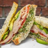 Roasted Turkey Sandwich · Avocado, sprouts, cucumbers, tomatoes, mayonnaise, and spicy mustard on whole wheat.