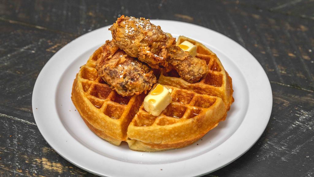 Chicken Waffle · Fresh made Belgian waffle, lightly breaded chicken leg & thigh with maple syrup.