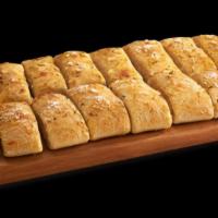 Howie Bread ( Garlic Bread ) · Buttered garlic breadsticks topped with Parmesan your choice of dipping sauce on side.