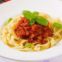 Fettuccine With Bolognese Sauce · Bolognese sauce mixed with.