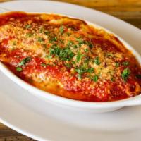 Baked Ziti · Neapolitan style ziti baked in choice of sauce. Served with two garlic rolls.