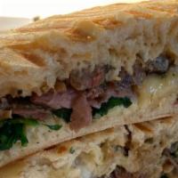 Carne Asada Panini Sandwich · 6” Hoagie, sautéed  steak, sautéed mushrooms, lettuce,  jalapeños, pepper jack cheese,carame...
