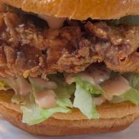 The Crispy  Chicken Sandwich · 6 oz Crispy chicken breast, brioche  bread, secret sauce, shredded lettuce, pickles. Side of...