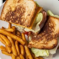 Club · Turkey and Ham with Bacon, Lettuce, Tomato, Cheese and Mayonnaise
