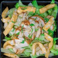 Asian Chicken Salad · Iceberg lettuce, sliced almonds, crispy won-ton strips, marinated chicken, sesame soy dressi...