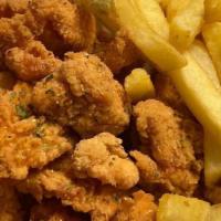 Salmon Bites Combo · Salmon Bites marinated, seasoned and fried with fries. Comes with Ketchup, Hot Sauce, and Cr...