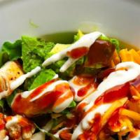 Bbq Chicken Cobb Salad · Romaine lettuce, BBQ chicken, bacon, sharp cheddar cheese, hard boiled eggs, tomatoes, fried...
