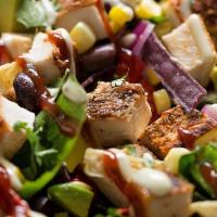 Bbq Chicken Salad · Tender chicken, black beans, corn, tomatoes, onions, tortilla strips, cheese with a BBQ sauc...