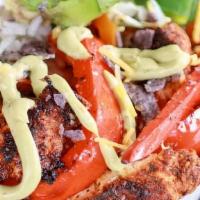 Grilled Chili Lime Chicken Fajita Bowl · Marinated chicken, avocado slices, grilled red and green peppers with a chili lime dressing ...