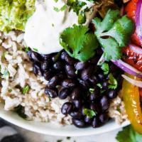 Fajita Chicken Burrito Bowl · Juicy chicken, grilled peppers and onions, cilantro lime rice, black beans, corn, diced red ...