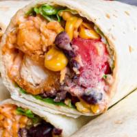 Southwest Chicken Wrap · Crispy or grilled chicken, lettuce, tomato, corn, black beans, shredded cheddar cheeses and ...