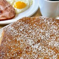 Shack Slam · Two fluffy, tender buttermilk pancakes served with creamy maple butter & syrup with two eggs...