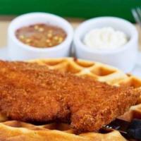 Chicken And Waffle · Crispy panko fried chicken sits on from scratch Belgian waffle. Served with maple butter and...