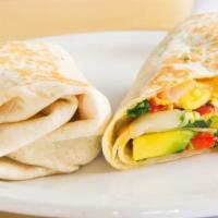 Breakfast Veggie Wrap · Two eggs scrambled with cheddar cheese, avocado, onions, peppers and greens all wrapped in a...
