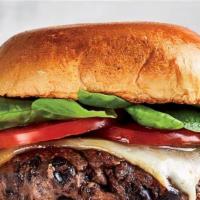 Black Bean Burger · House made burger, sesame brioche bun, butter lettuce, tomato, avocado, chipotle aioli.