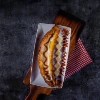 Maduro Con Queso · Sweet plantain with cheese and guava sauce