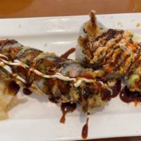 Dynamite Roll · Spicy. Salmon, asparagus, and crab meat wrapped in seaweed. Deep-fried with eel sauce, hot s...