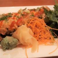 Diablo Roll · Tuna, salmon, yellow tail, crab fried stopped with fish egg scallions and spicy shrimp sauce.