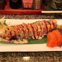 St Johns Town Center · Tempura shrimp, mango with salmon, avocado and spicy tuna outside, topped with crunch, scall...