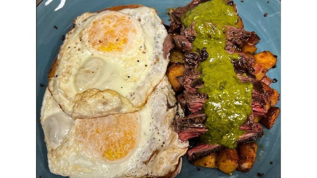 Steak & Eggs · Served with breakfast potatoes and refried beans/ Acompañados con papas de la casa y frijoles.